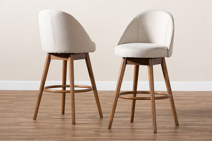 Baxton Studio Carra Mid-Century Modern Light Beige Fabric Upholstered Walnut-Finished Wood Swivel Bar Stool Set of 2