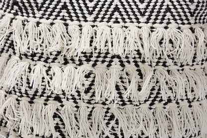 Baxton Studio Alain Moroccan Inspired Black and Ivory Handwoven Wool Tassel Pouf Ottoman