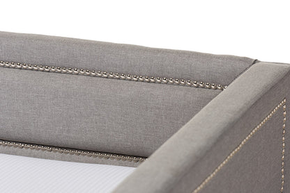 Baxton Studio Raymond Modern and Contemporary Grey Fabric Nail Heads Trimmed Sofa Twin Daybed with Roll-Out Trundle Guest Bed