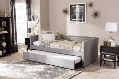 Baxton Studio Raymond Modern and Contemporary Grey Fabric Nail Heads Trimmed Sofa Twin Daybed with Roll-Out Trundle Guest Bed